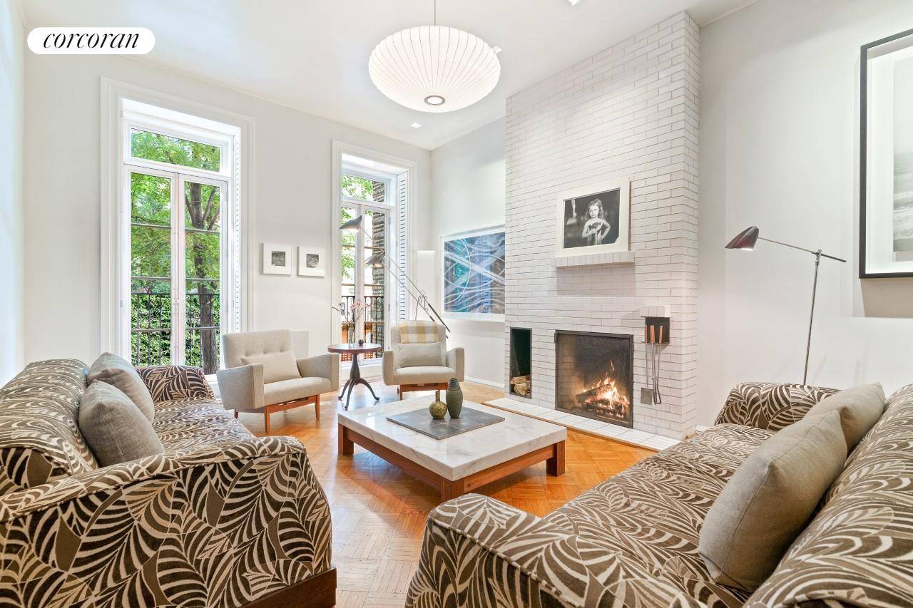 Located on a picturesque Greenwich Village Gold Coast block, 71 W 11th Street, a home with grand proportions and plenty of character, is now on the market.