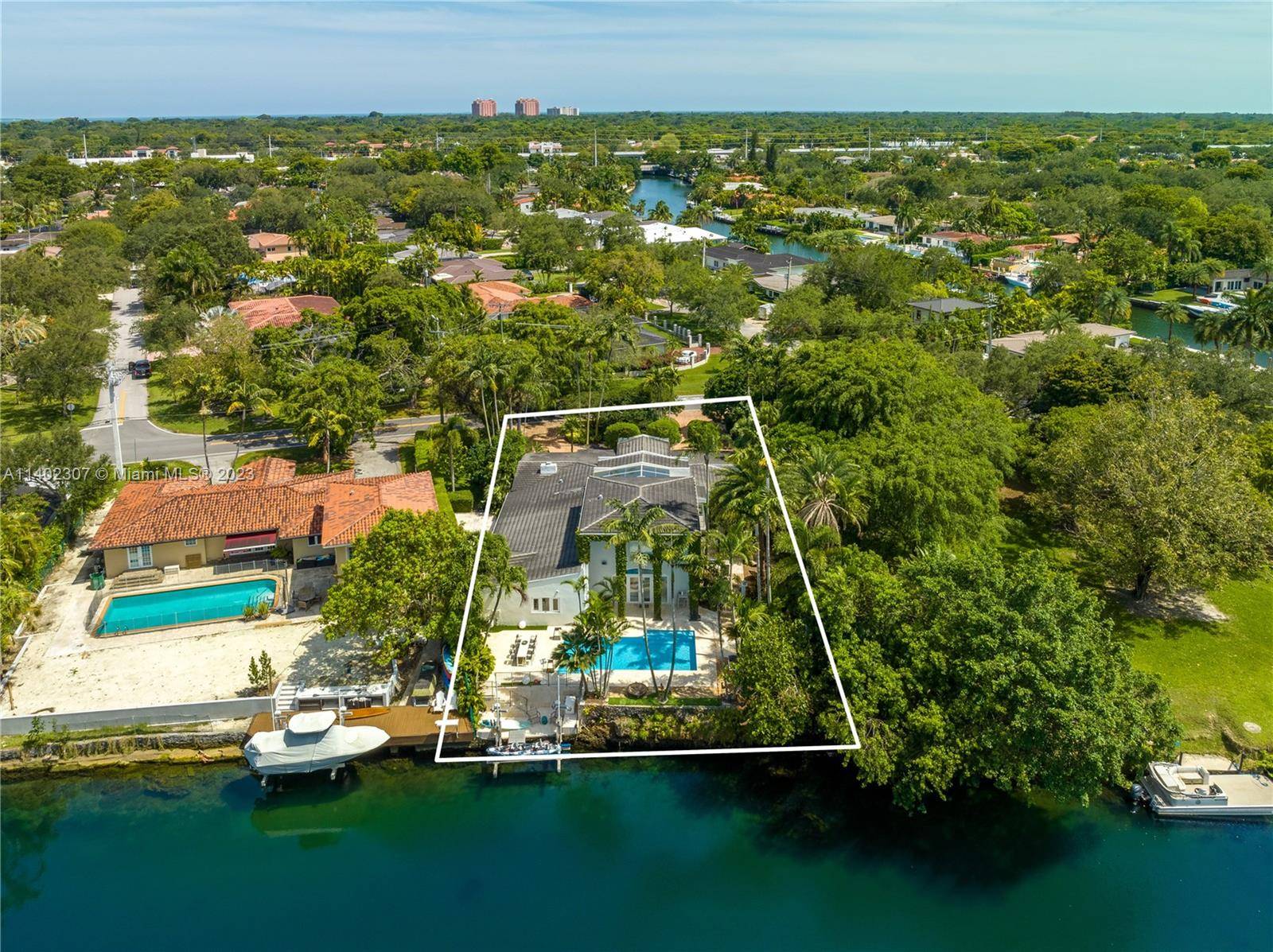 Spectacular 5, 681 SF contemporary home on the Coral Gables Waterway, with 5 bedrooms and 5.