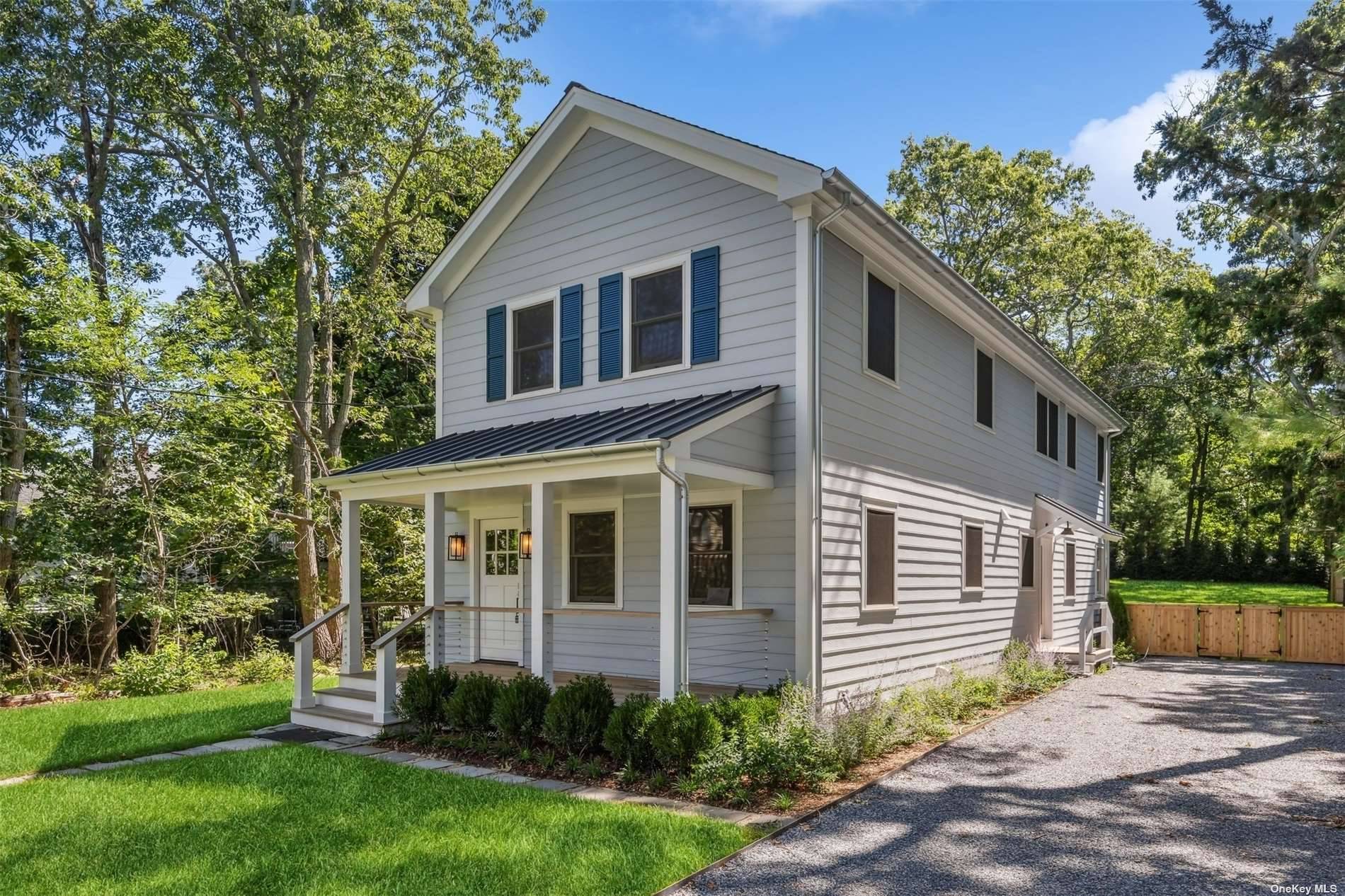 Set on a quiet village street just minutes from the world class shops, restaurants and waterfronts of Sag Harbor lies this newly renovated 4 bedroom, 3.
