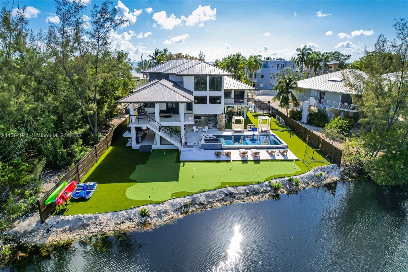 Welcome to Oasis Waterfront Pool Lux Villa in the most exclusive area of Key Largo.