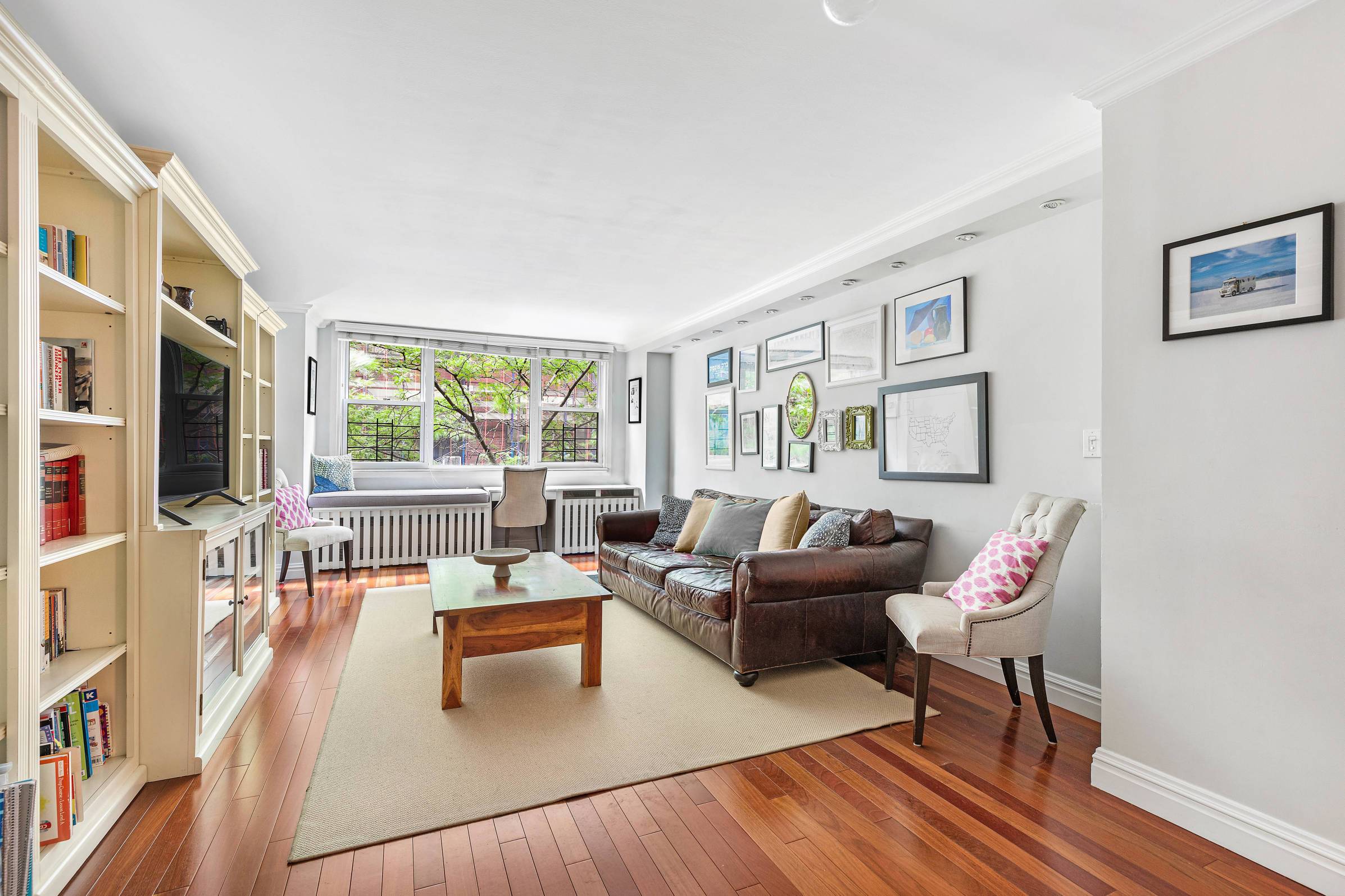 Renovated large two bed, two bath in one of Chelsea's premier full service coops.