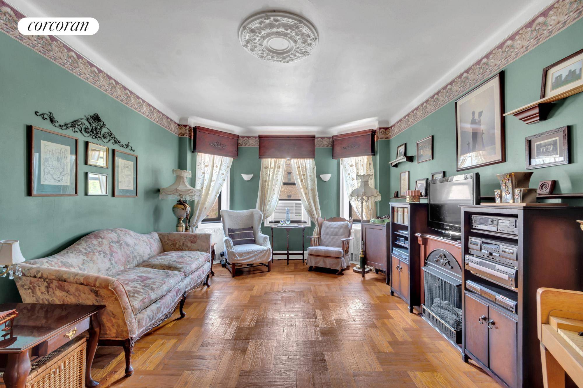 This charming 1 bed 1bath in Jackson Heights will sweep you away to Paris for below market price of 418, 000 !