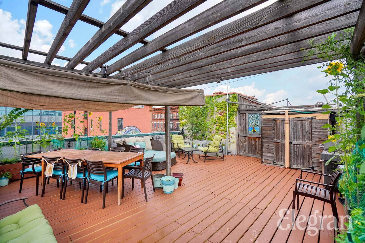 This beautiful south facing one bedroom home comes with a huge private roof deck !