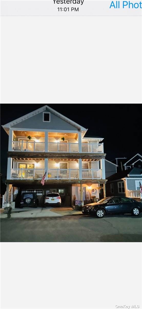 West End Summer Rental ! Open layout kitchen, dining, living area with three decks.