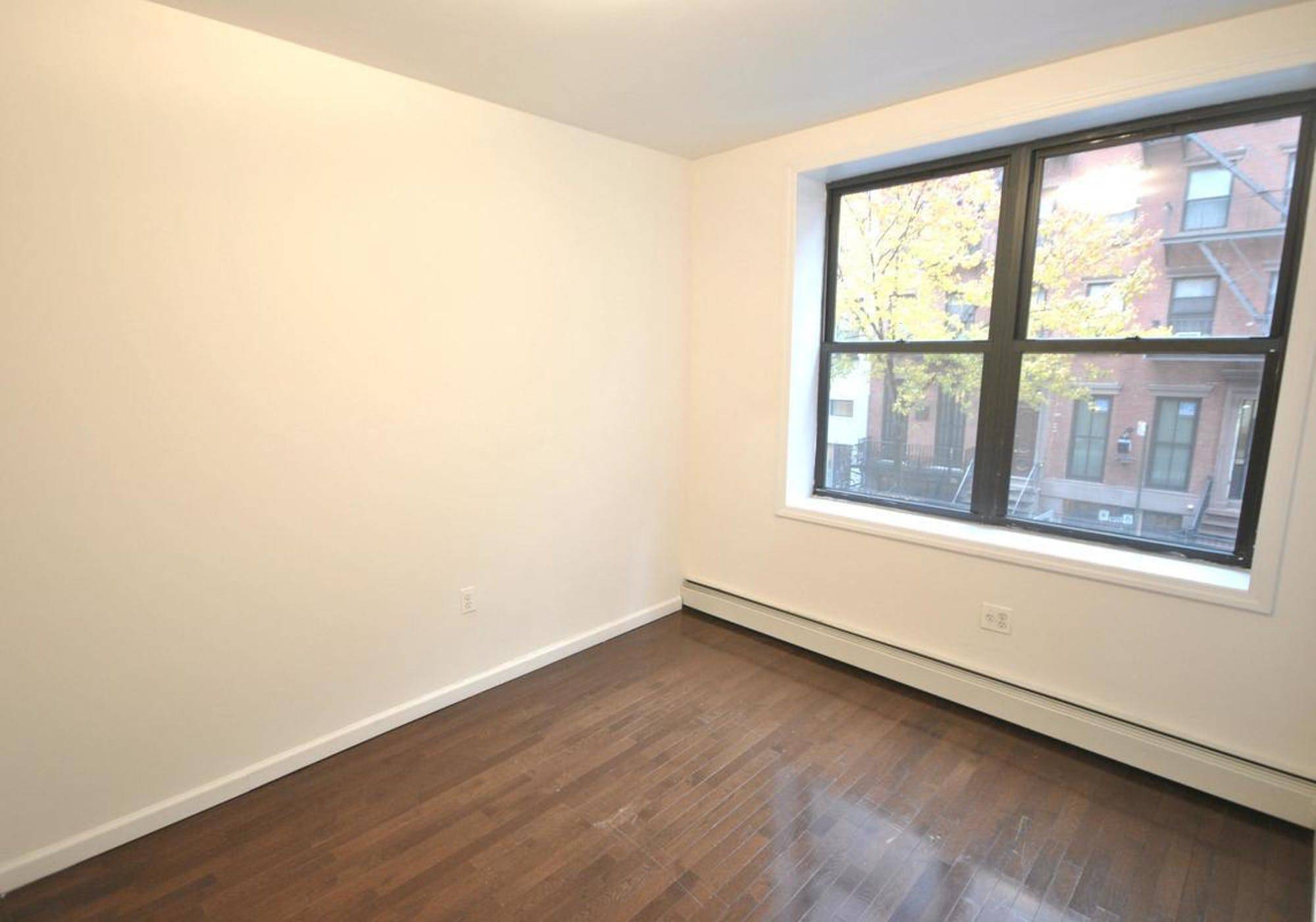 Large and Renovated True 1 bedroom in the Heart of Murray Hill with Private Outdoor Space.