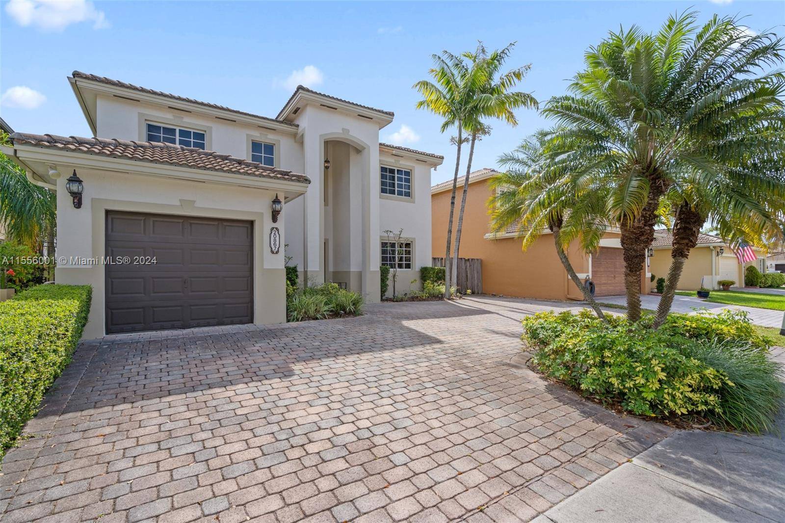 Welcome to your dream home in the serene community of Pelican Bay at Old Cutler Lakes.