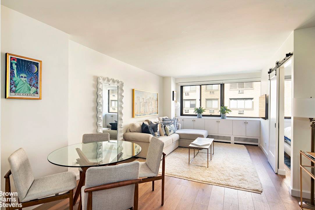 12FS at The Chelsea Lane is a stunning 1 bedroom apartment with a recently renovated bath, updated kitchen, and gorgeous, wide plank flooring throughout.