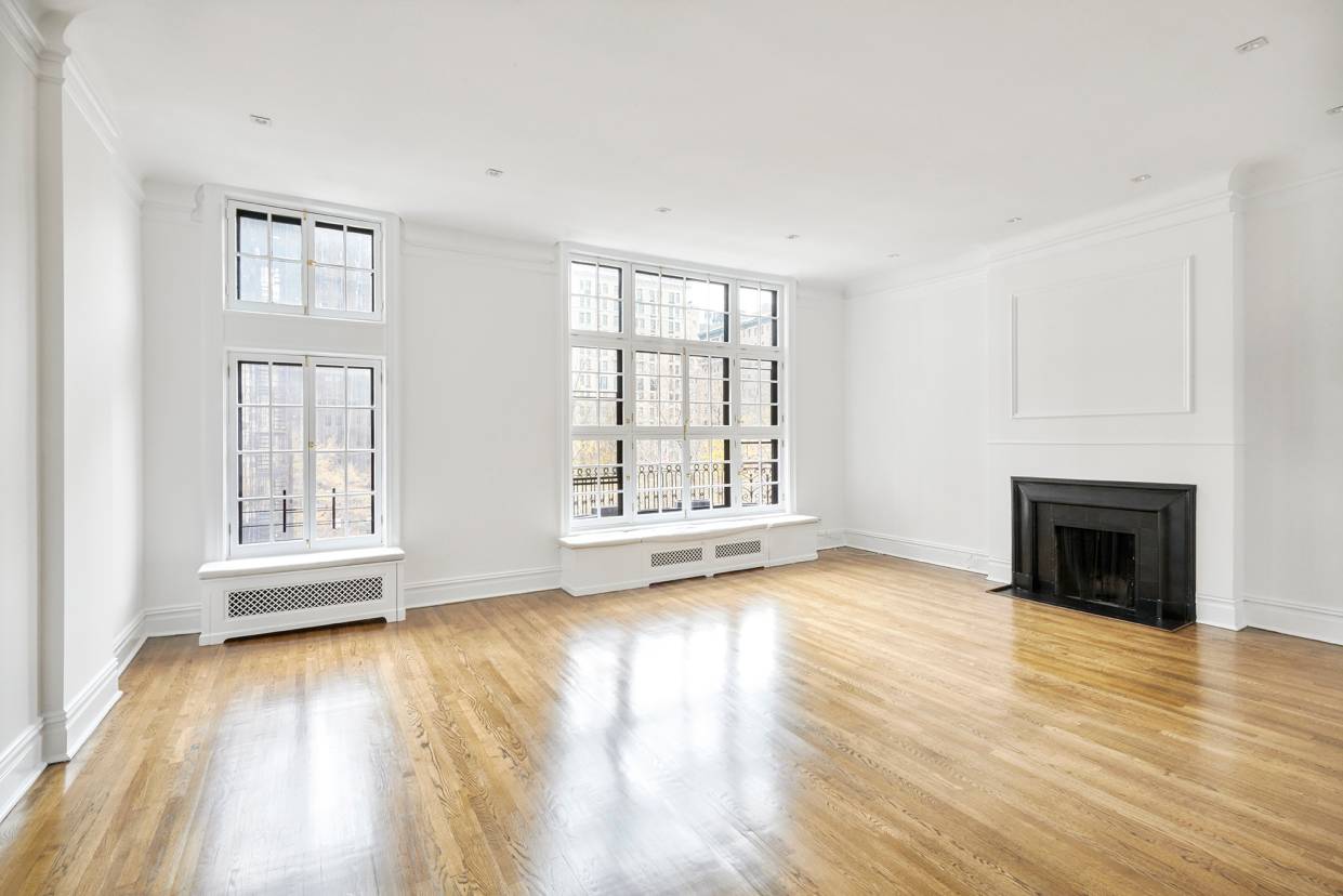 Step off the elevator directly into your luxurious penthouse duplex atop a stunning 27' wide townhouse on famed Gramercy Park, now featuring a PRIVATE ROOF DECK.