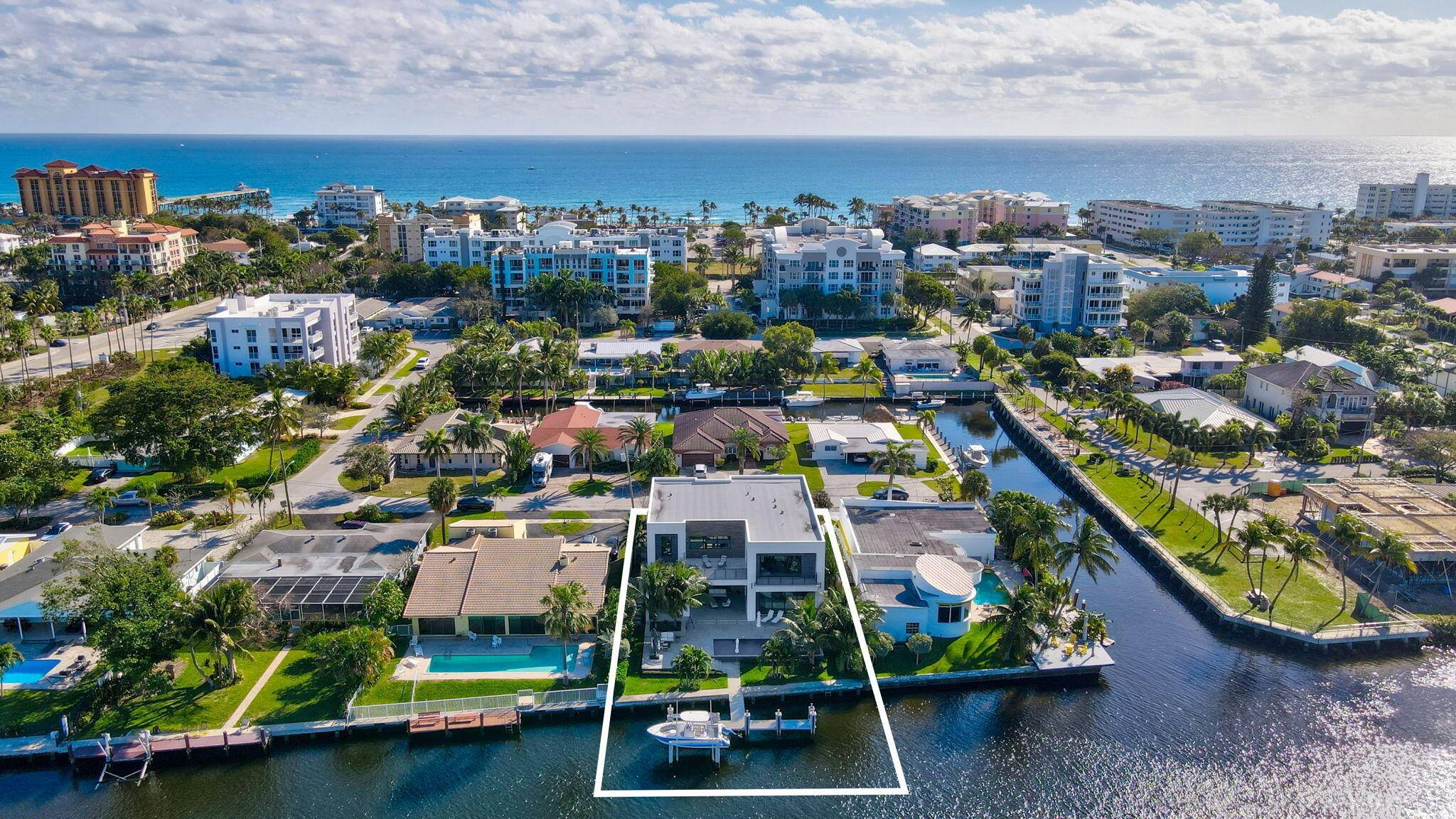 Welcome to the epitome of luxury living with this direct intracoastal contemporary estate, located on the east side of the intracoastal in a no wake zone.