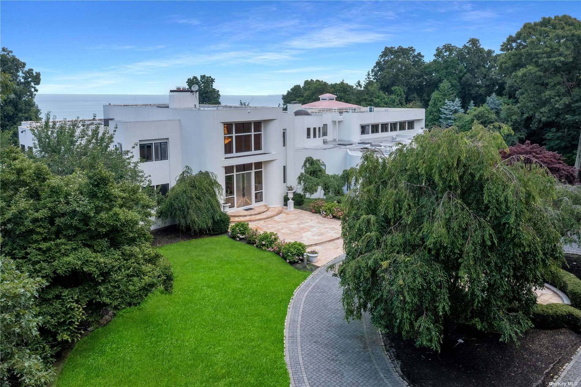 Welcome to this extraordinary 20, 000 sq ft Contemporary villa nestled on 8.