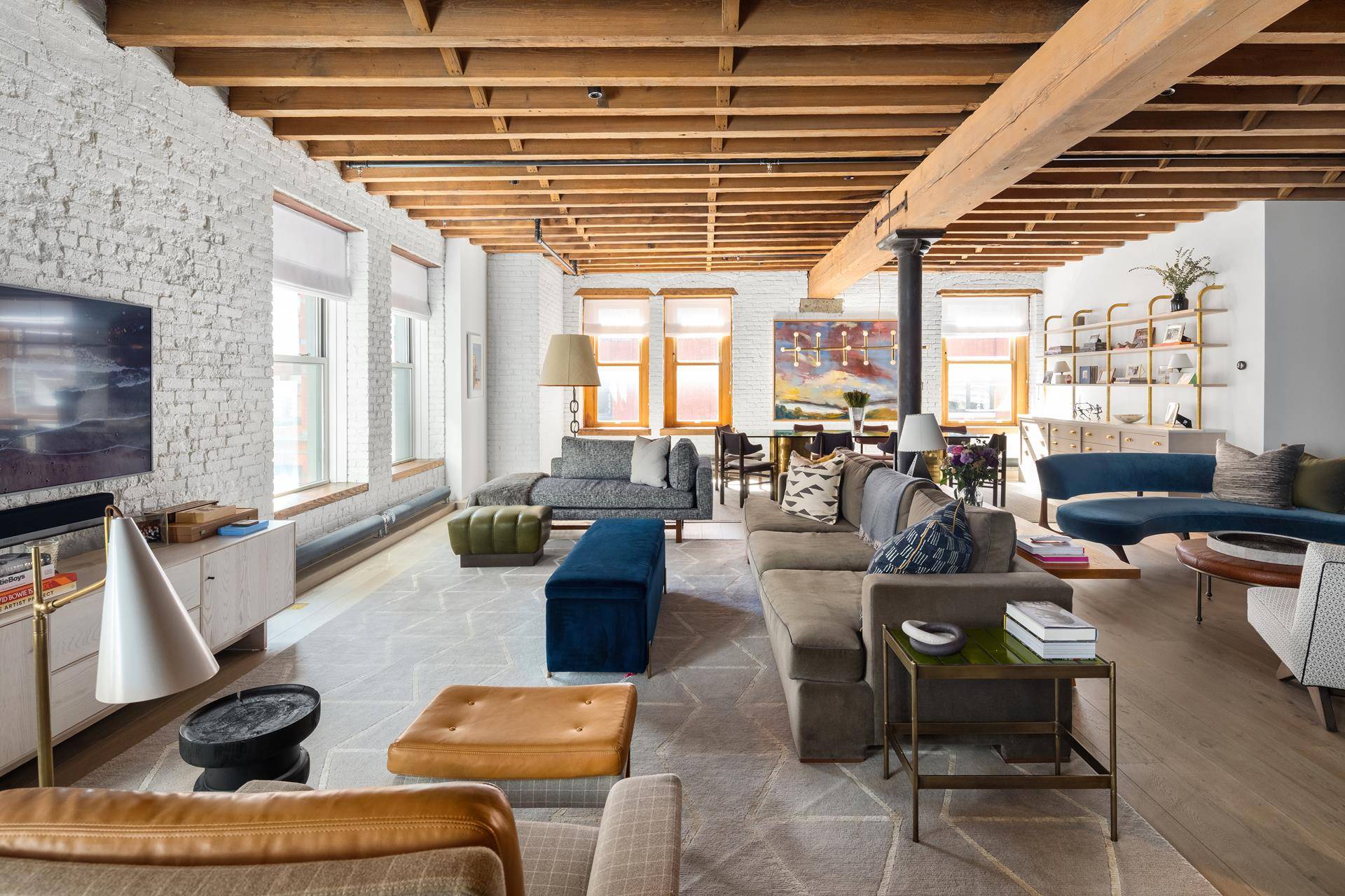 Experience authentic Tribeca loft living.