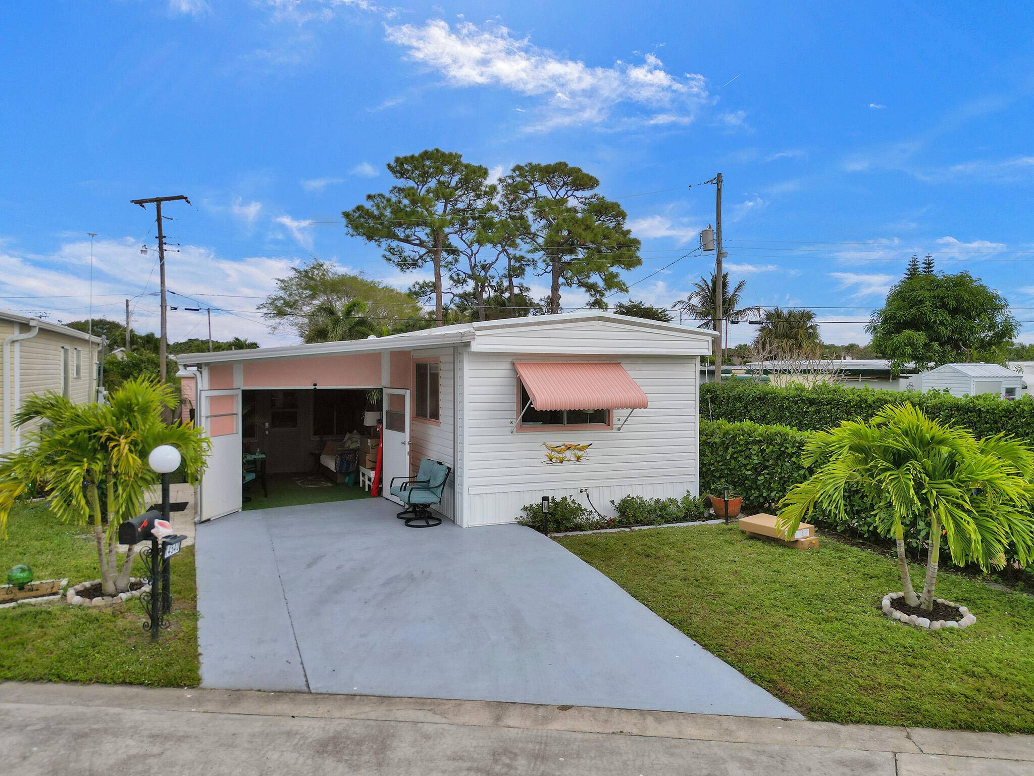 WELCOME HOME TO THIS KEY WEST STYLE COMPLETELY UPGRADED FRUNISHED PROPERTY INCLUDES THE LAND.