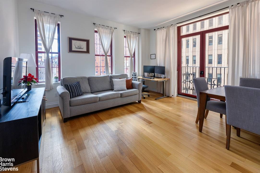 Bright corner one bedroom with 10' ceilings in the heart of Financial District in a boutique Prewar condominium.
