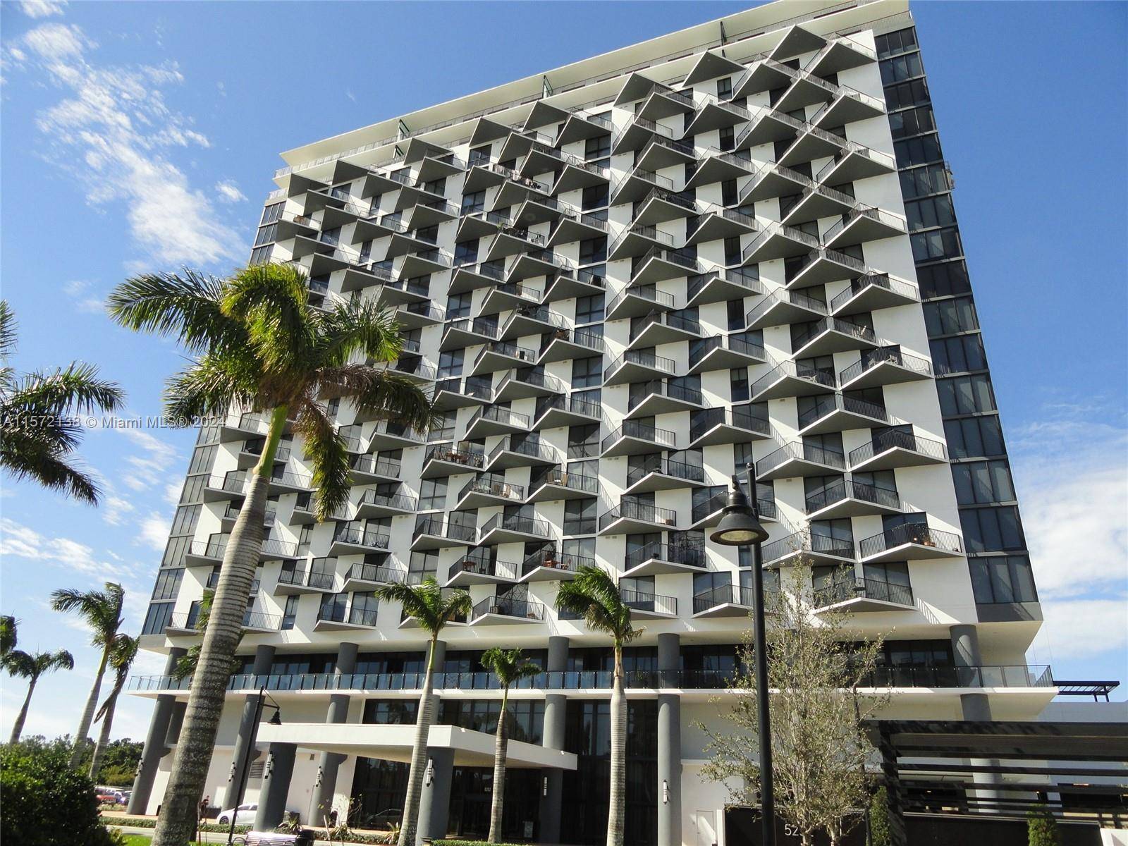 Sleek modern 2 2 located in the desirable Downtown Doral Community.