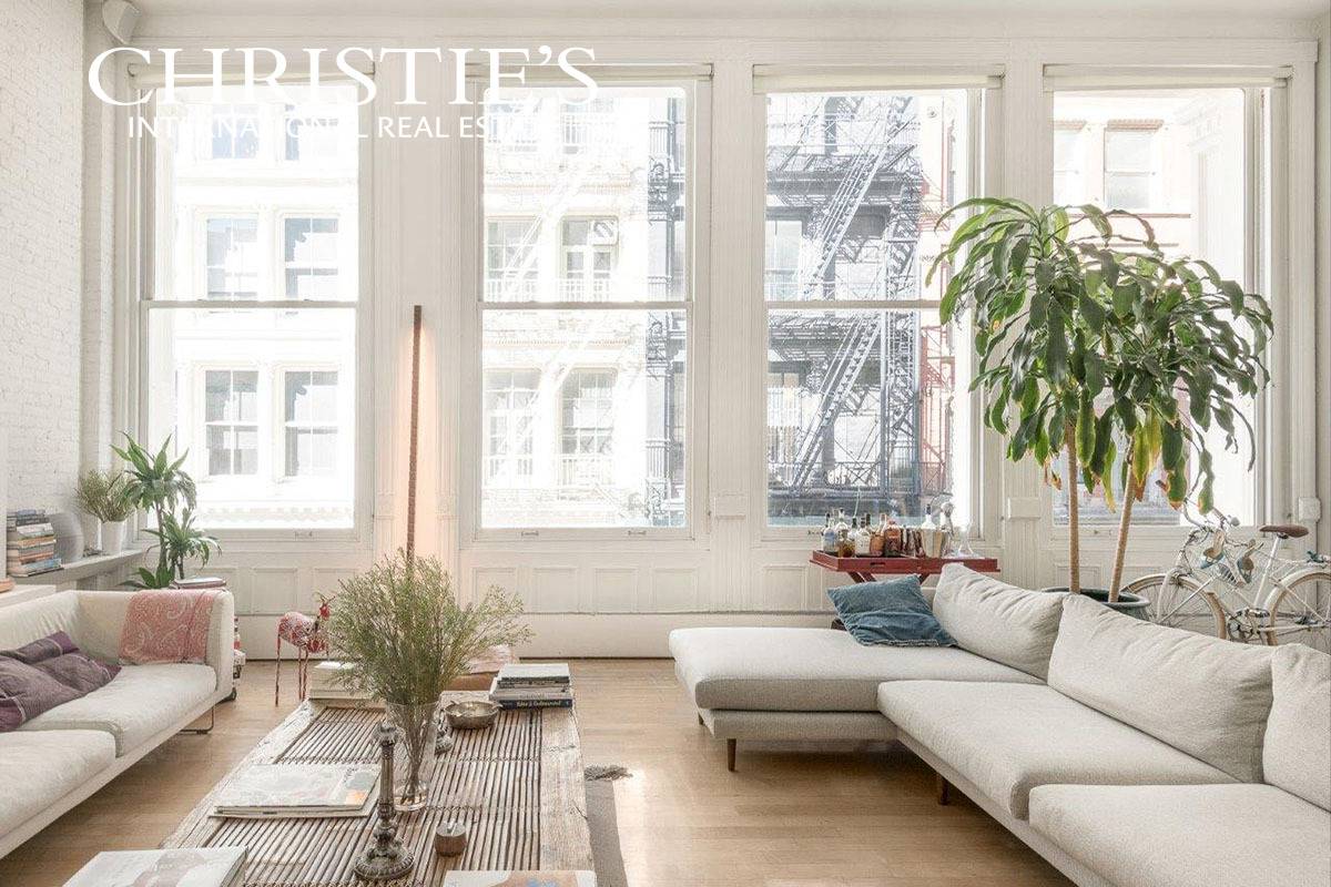 FURNISHED SOHO LOFT Hidden within a stunning 1885 cast iron loft building on one of SoHo's best, and quietest, cobblestone streets, is this beautifully furnished duplex home.