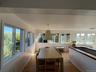 Dining room featuring wood finished floors and baseboards