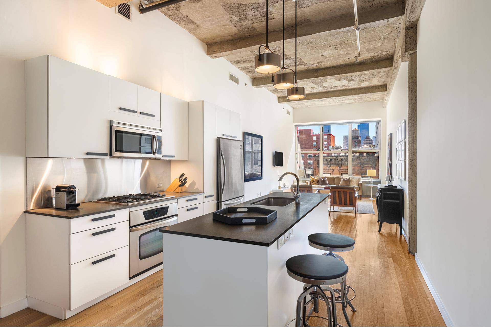 Furnished Rental A spectacular and Spacious Midtown Loft with 12 foot ceilings is a rare find !