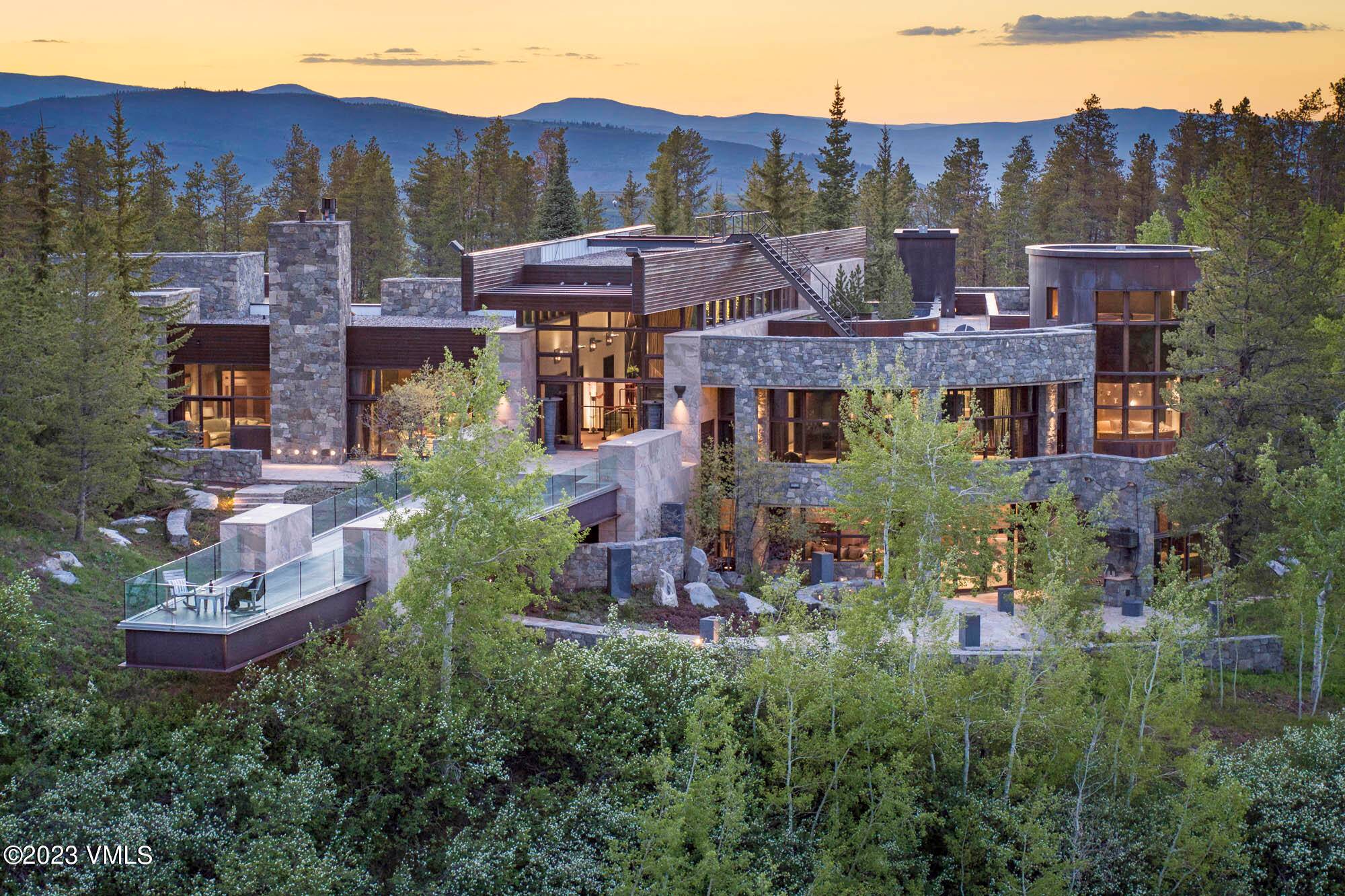 Surrounded by hundreds of open acres, bordering pristine National Forest land, this premium estate provides the ultimate ambiance and seclusion for a Rocky Mountain retreat.