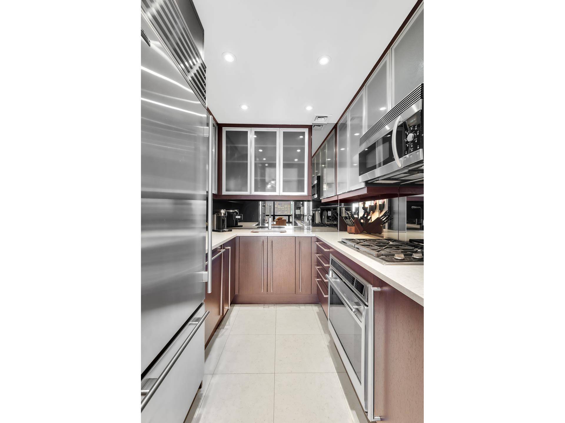 Situated just 2 blocks from Central Park on the 59th floor of a white glove, full service condominium, this corner 2 bedroom, 2 bath residence spares no detail and defines ...