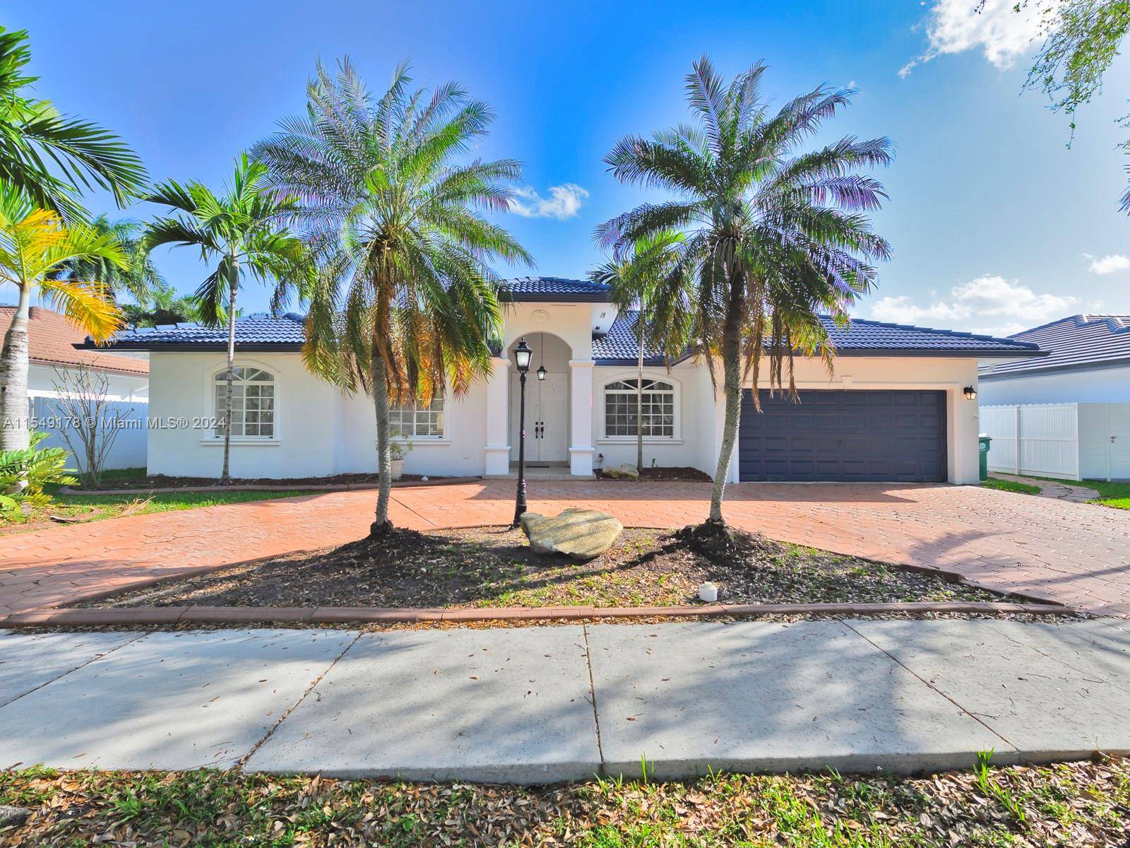 Spectacular 4 Bed 3. 5 Bath pool home located in the exclusively guard gated community of Royal Oaks in Miami Lakes.