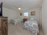 The second bedroom is located on the other side of the home and includes a walk in closet