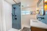 Updated guest bathroom is coastal modern