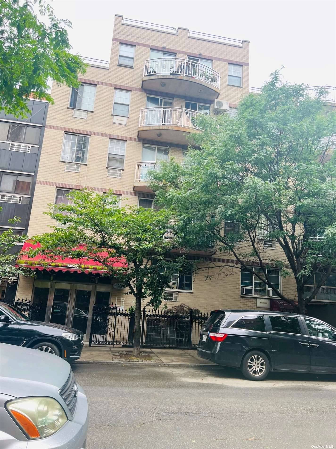 Heart of Flushing, 3BRs, 2 baths, 2 balcony duplex condo apartment with parking spot for sale.
