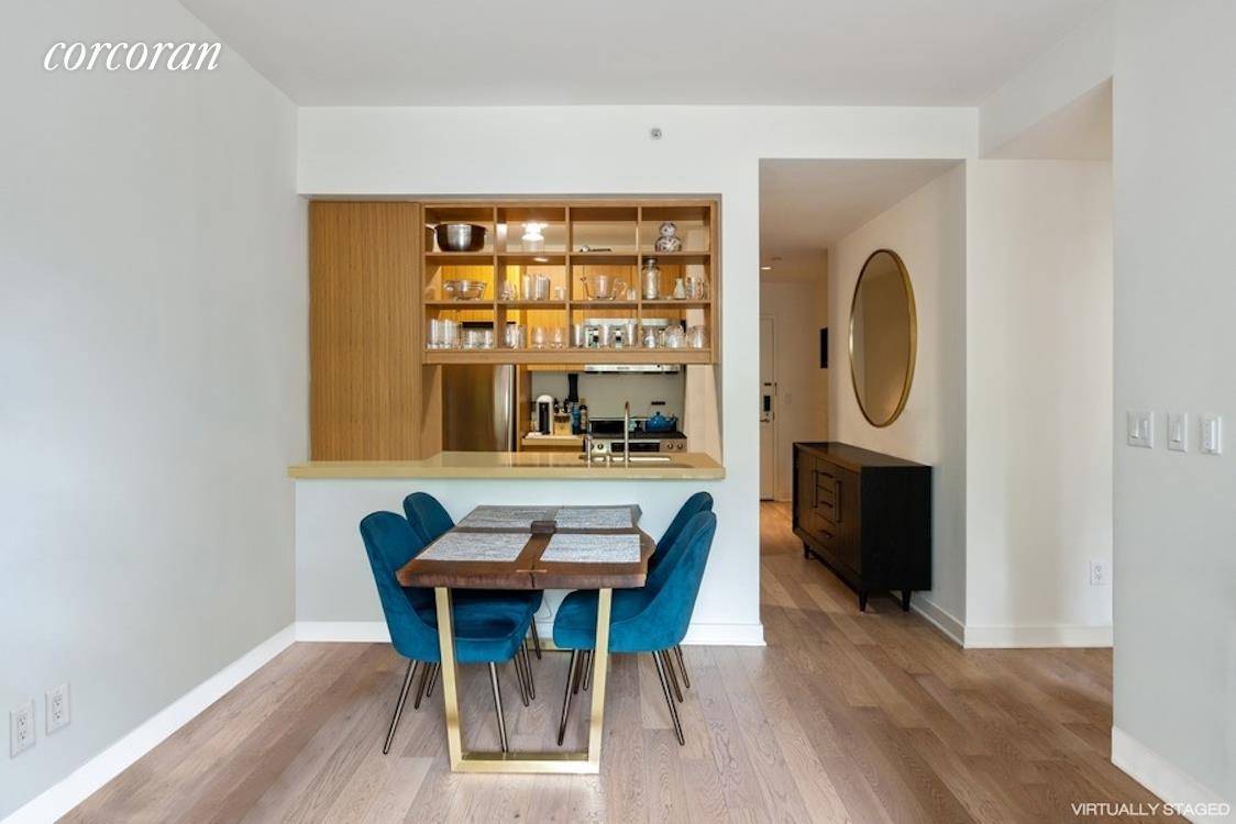 This fabulous 1 Bedroom in the heart of South Chelsea features a luxury pass through kitchen with breakfast bar, stainless steel appliances, dishwasher, gas range and built in microwave.
