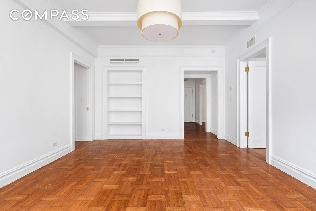 Welcome home to a sprawling pre war 3 BR 2 BA with separate windowed home office and formal dining room in an elevator building one block from Central Park.