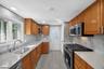 Updated Kitchen w/ Door to BY