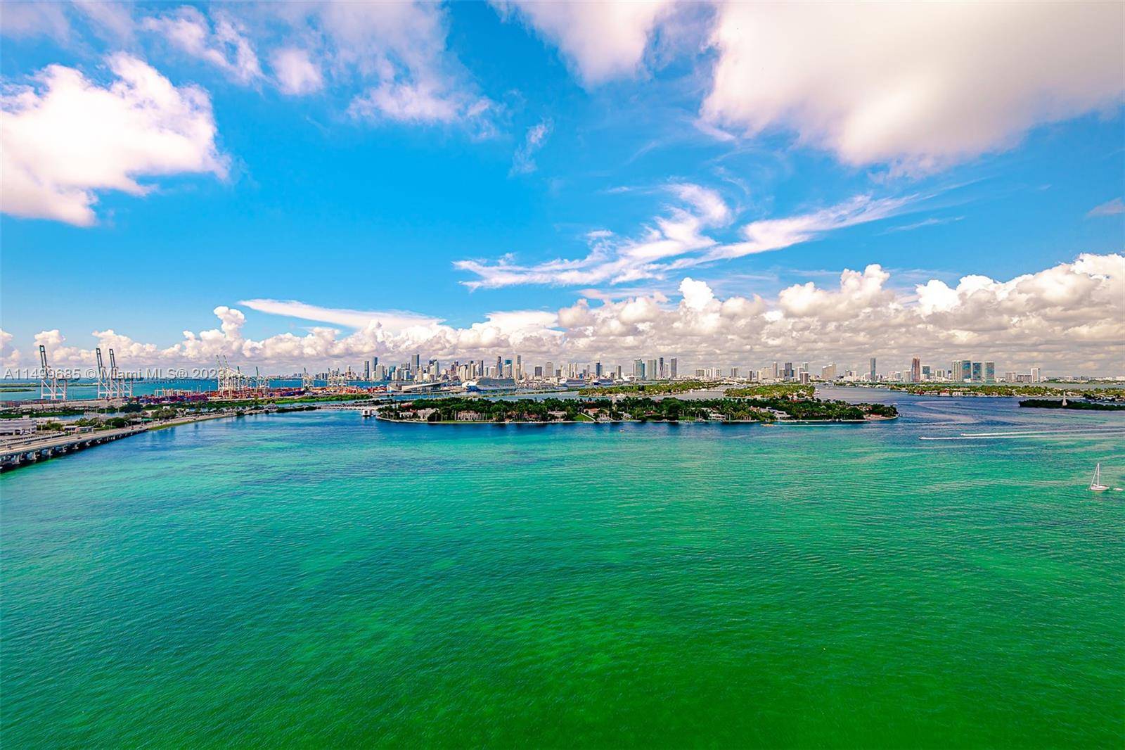 Pristine and fully renovated one bedroom with high quality finishes with direct views of Biscayne Bay, Downtown Miami Skyline, sunsets, and cruise ships, providing a picturesque and dynamic backdrop.