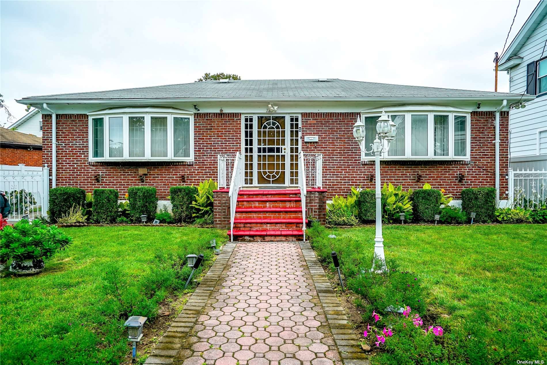 Lovely 3 bedroom, 2 bathroom Brick Ranch home in Queens Village is being SOLD AS IS.