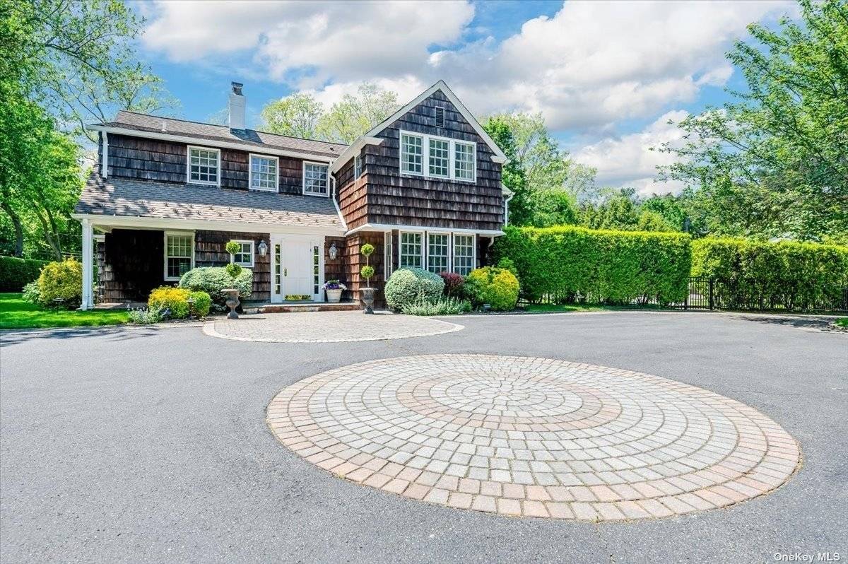 Privately Set on 1 Acre of Lushly Landscaped Gated Property, This Magnificent One Of A Kind Spacious Colonial Features a grand entrance w fireplace, the first floor offers a formal ...