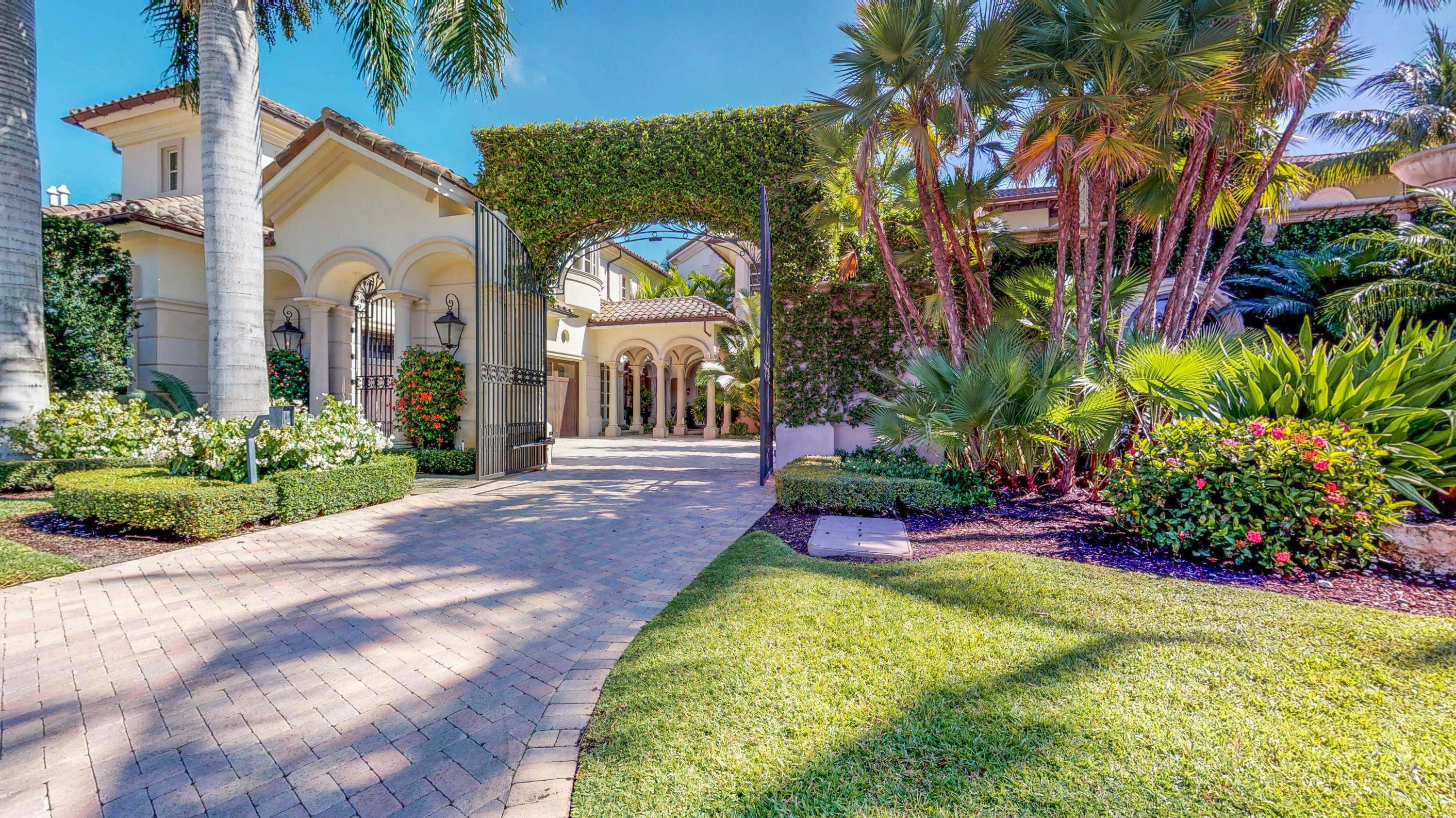 Live in the spectacular gated community of Mizner Lake Estates, an exclusive enclave in Boca Raton within the prestigious Boca Raton Resort Club.