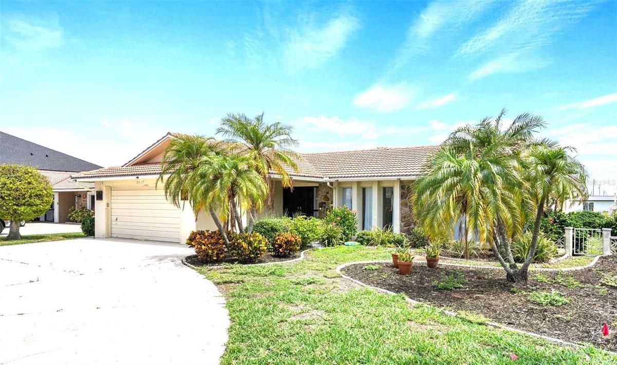 Waterfront Home, Tiled Roof. Circular Driveway