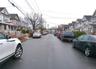 View of asphalt street with a residential view