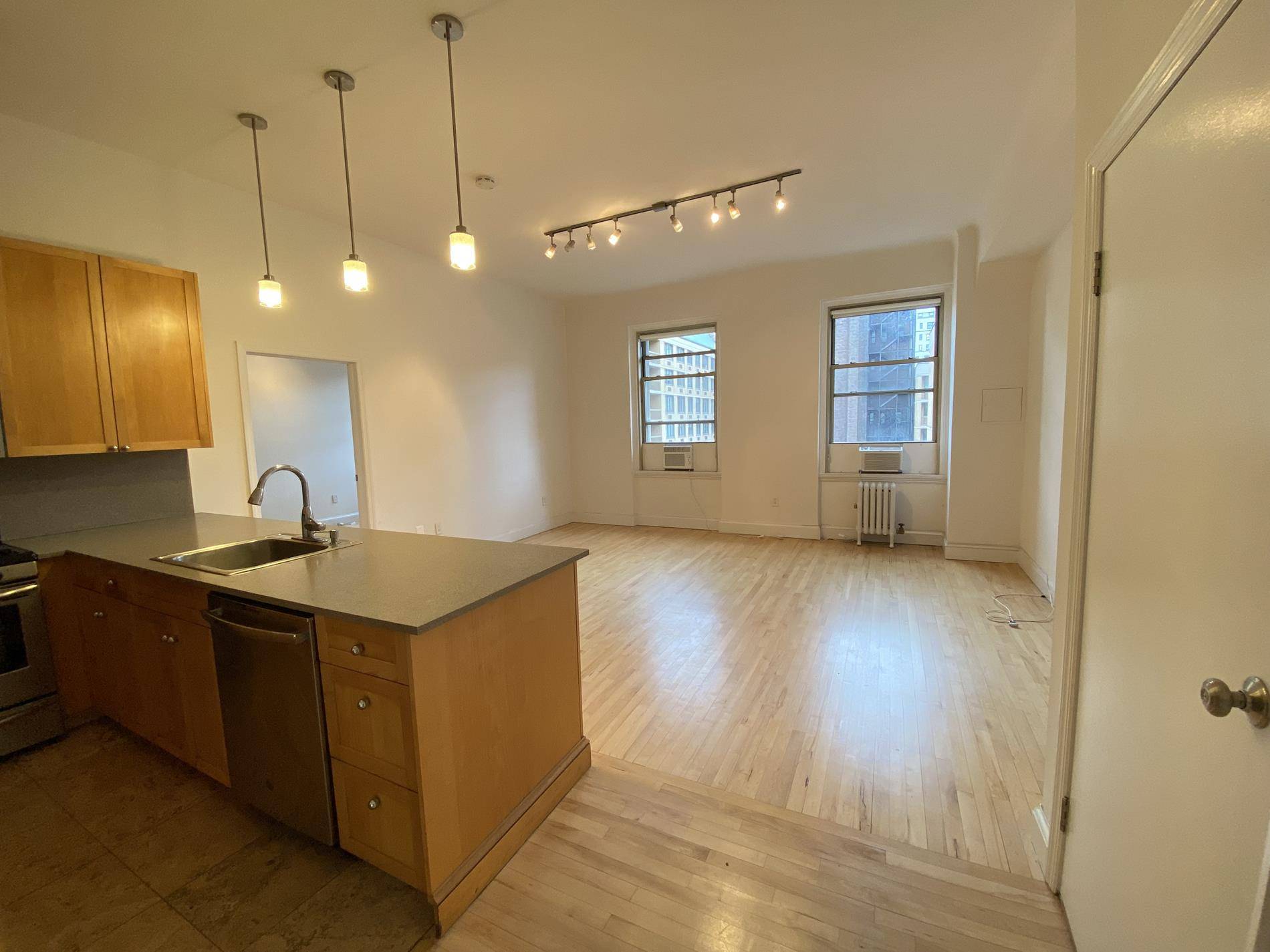 Renovated split two bedroom with two full marble baths, 11' ceilings and washer dryer in unit.