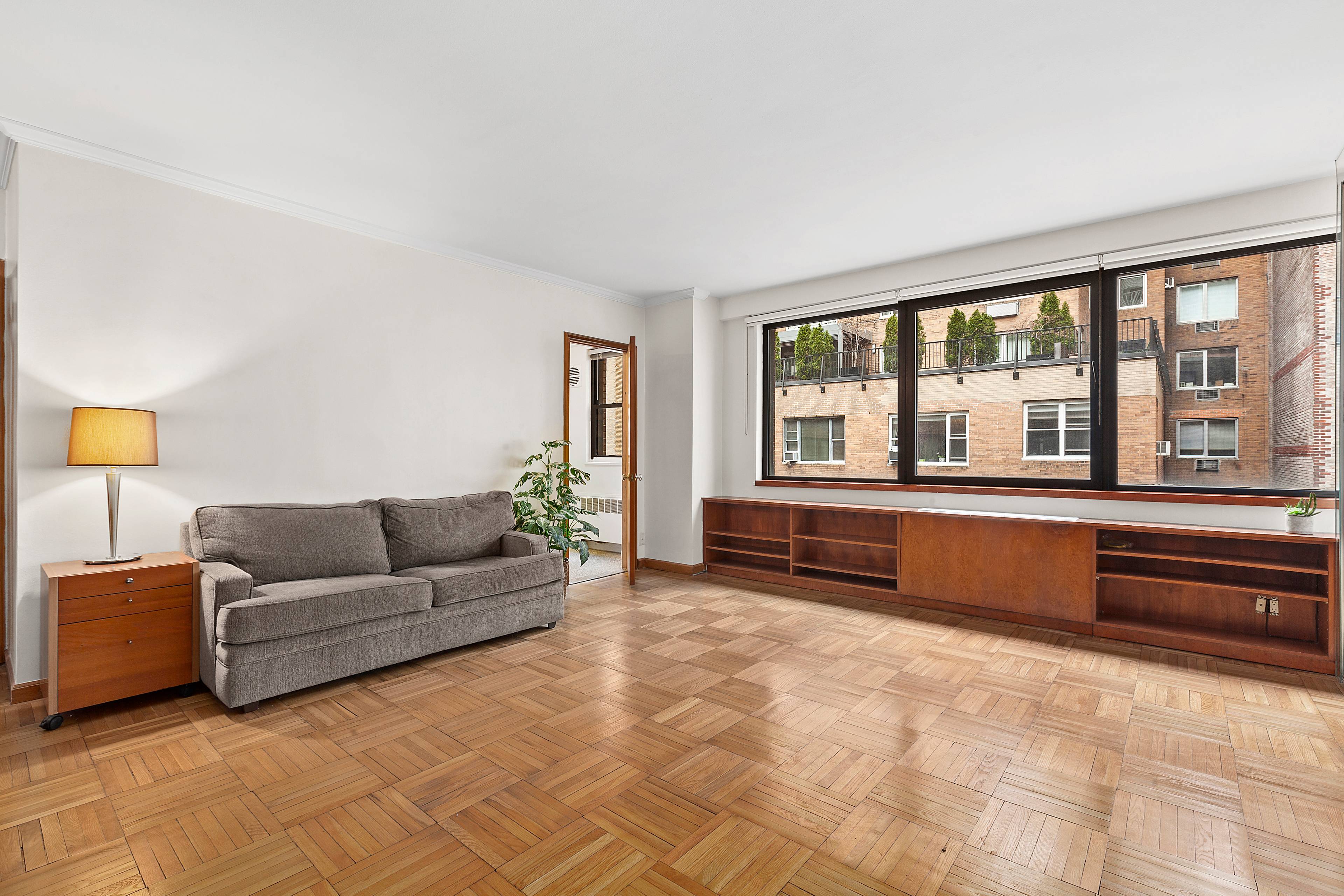 Presenting apartment 10G, a sunny amp ; oversized studio condominium on Central Park South offering low monthly taxes amp ; common charges, a large home office, abundant storage, a spacious ...