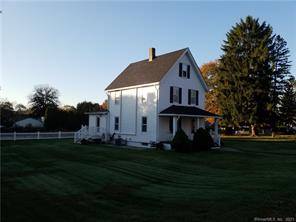 Naugatuck Gardens farmhouse Colonial offering 3 bedrooms, 2 full bathrooms on a level.