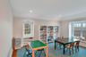 Dining space featuring dark wood-type flooring
