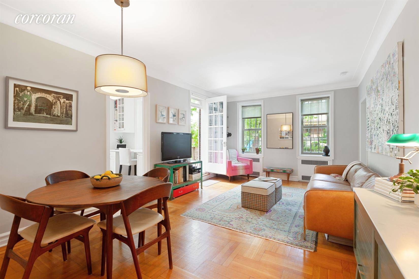 SHINES BRIGHT ! Ultra rare two bedroom coop with three exposures and a 520 SF private terrace.