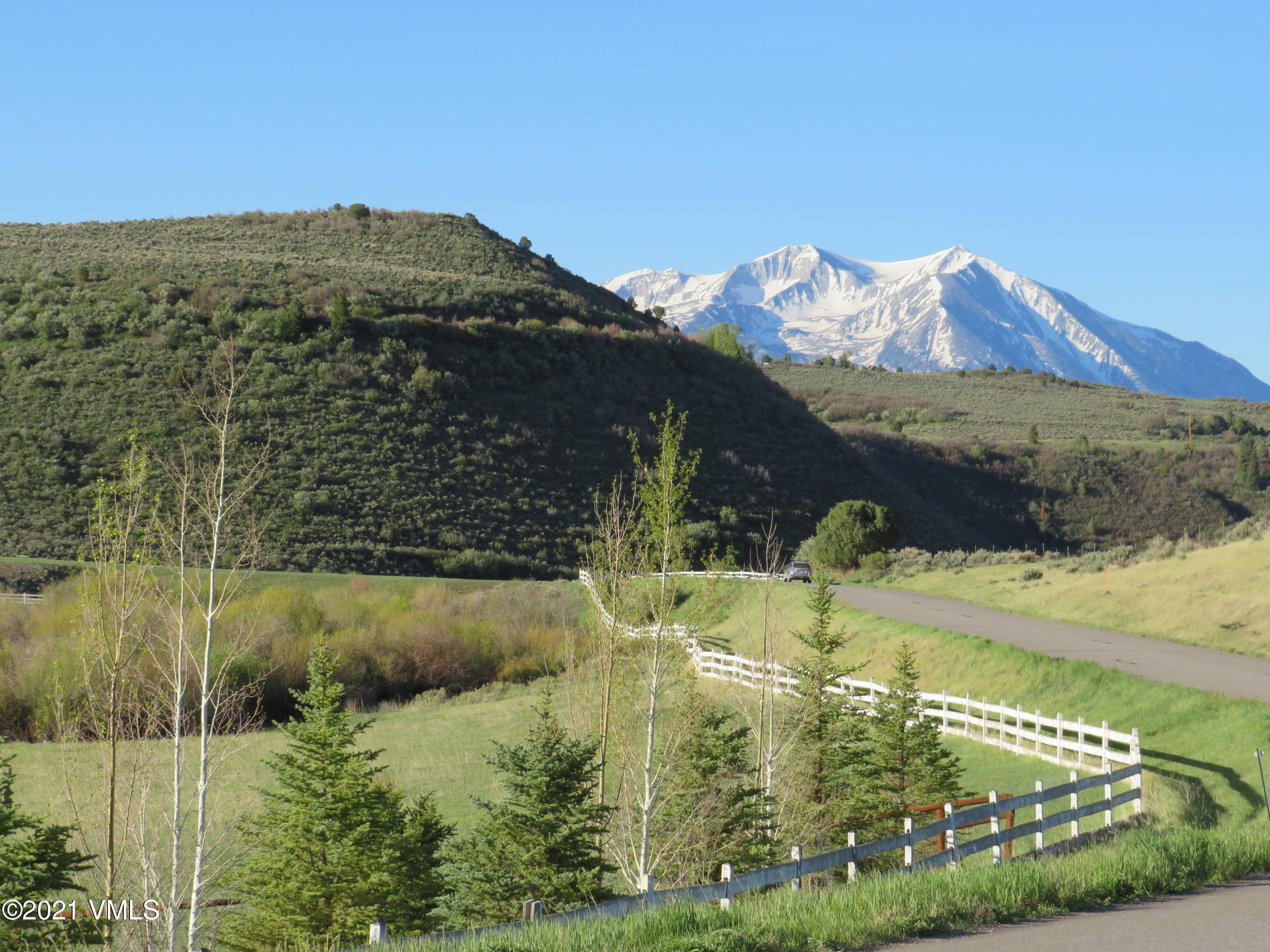 Full Throttle Ranch offers 222 acres with live water, extraordinary improvements, irrigated meadows, equestrian cattle infrastructure, and stunning views 15 minutes from Carbondale and only 45 minutes from Aspen.