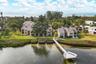 Rear of condo with Day Dock / Fishing Pier