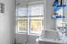 Bathroom featuring plenty of natural light and a walk in shower