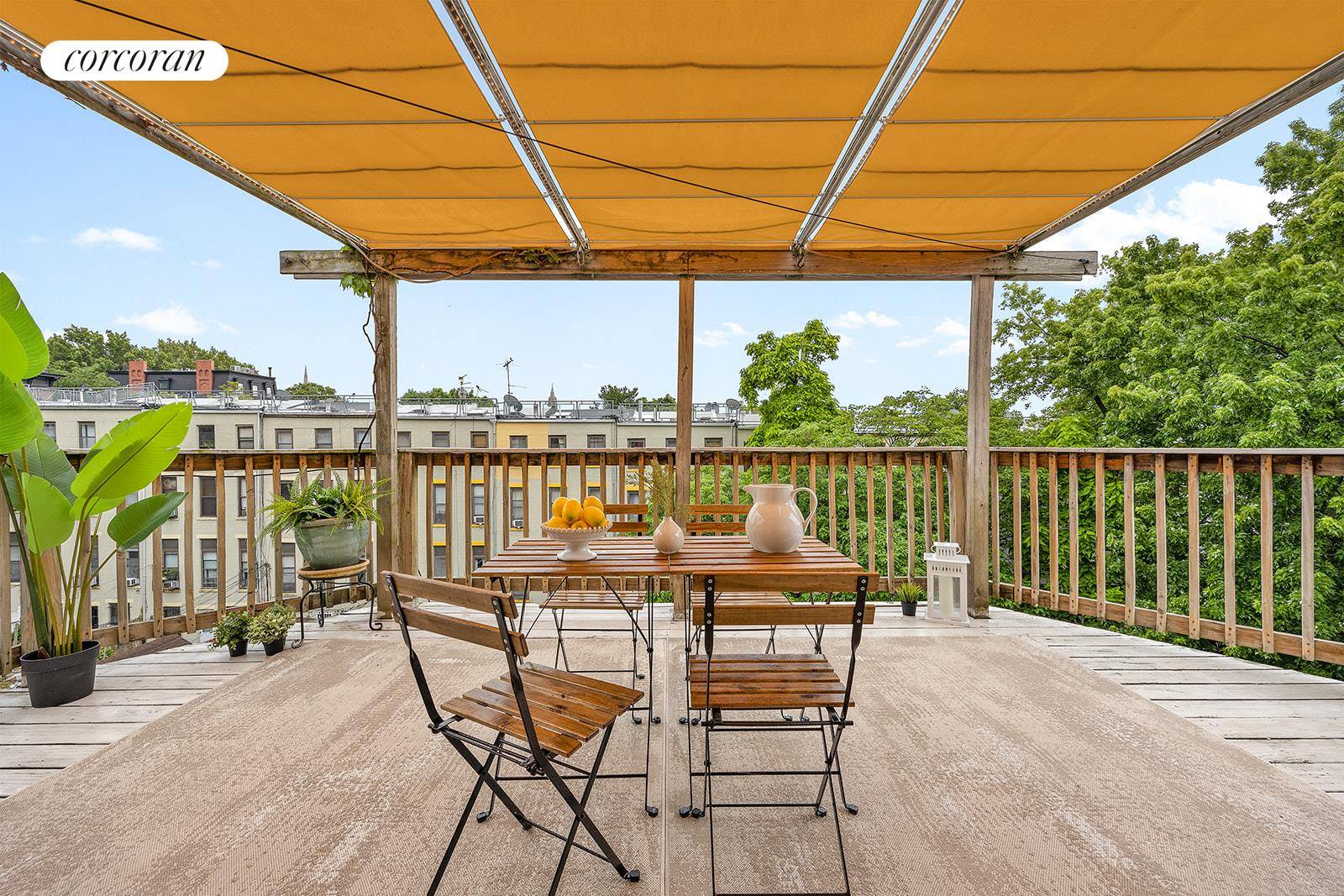 On the top floor of a wide brownstone this two bedroom, one bath coop is Park Slope magic light filled, with private outdoor space, a wood burning fireplace, low month ...