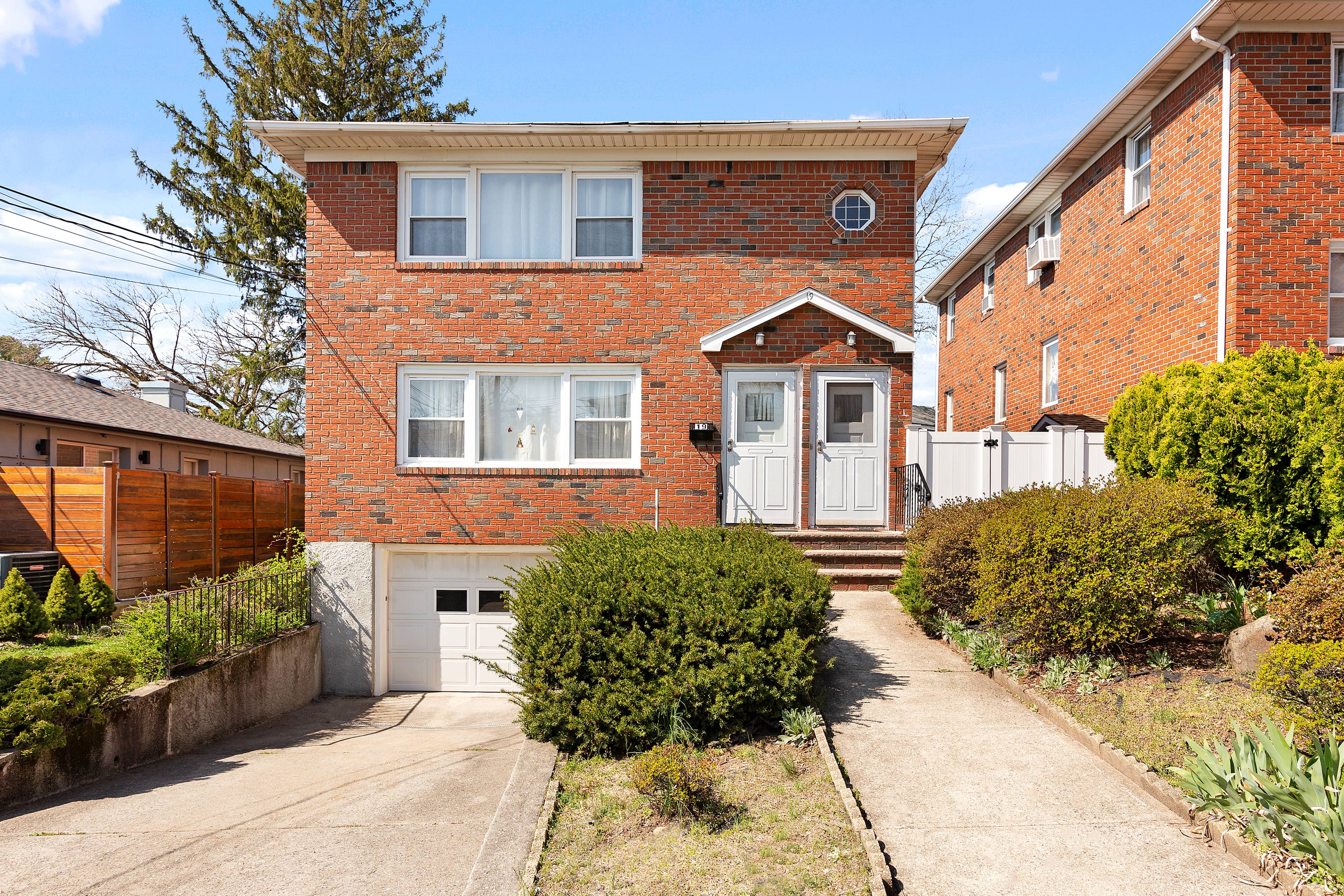 COMING SOON ! Make beautiful Sunnyside your home with this all brick two family home.