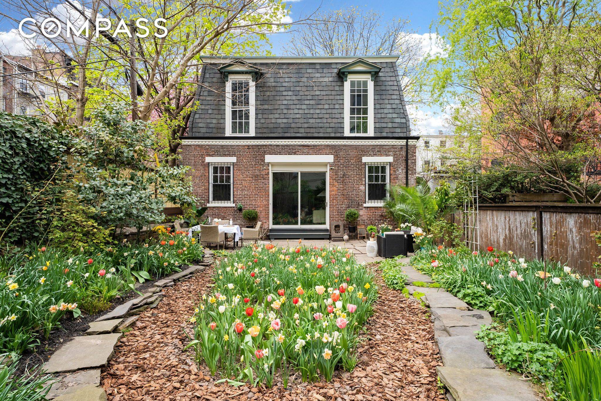 Seize this once in a generation opportunity to own a magnificent secluded, free standing 1870 s built double mansard carriage house with a massive garden tucked down a 5 car ...