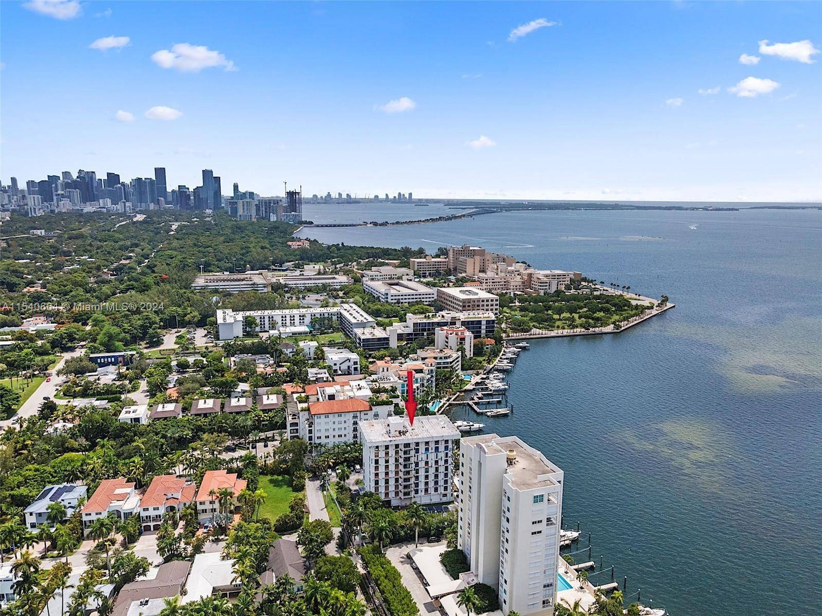Ultimate boutique waterfront building in Coconut Grove with marina.
