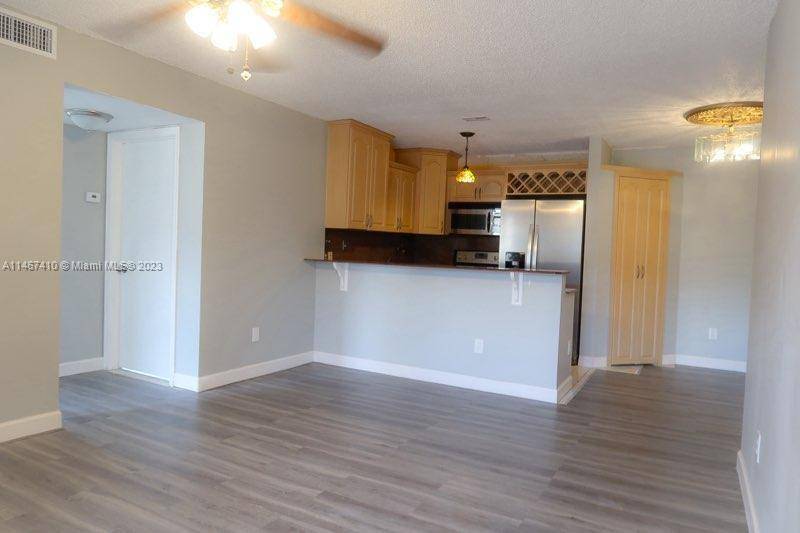 Lago Grande remodeled new floors 3 bed 2 bath AS IS condo on the 2nd floor in a secured gated community with furniture, it is located near many shopping amenities ...