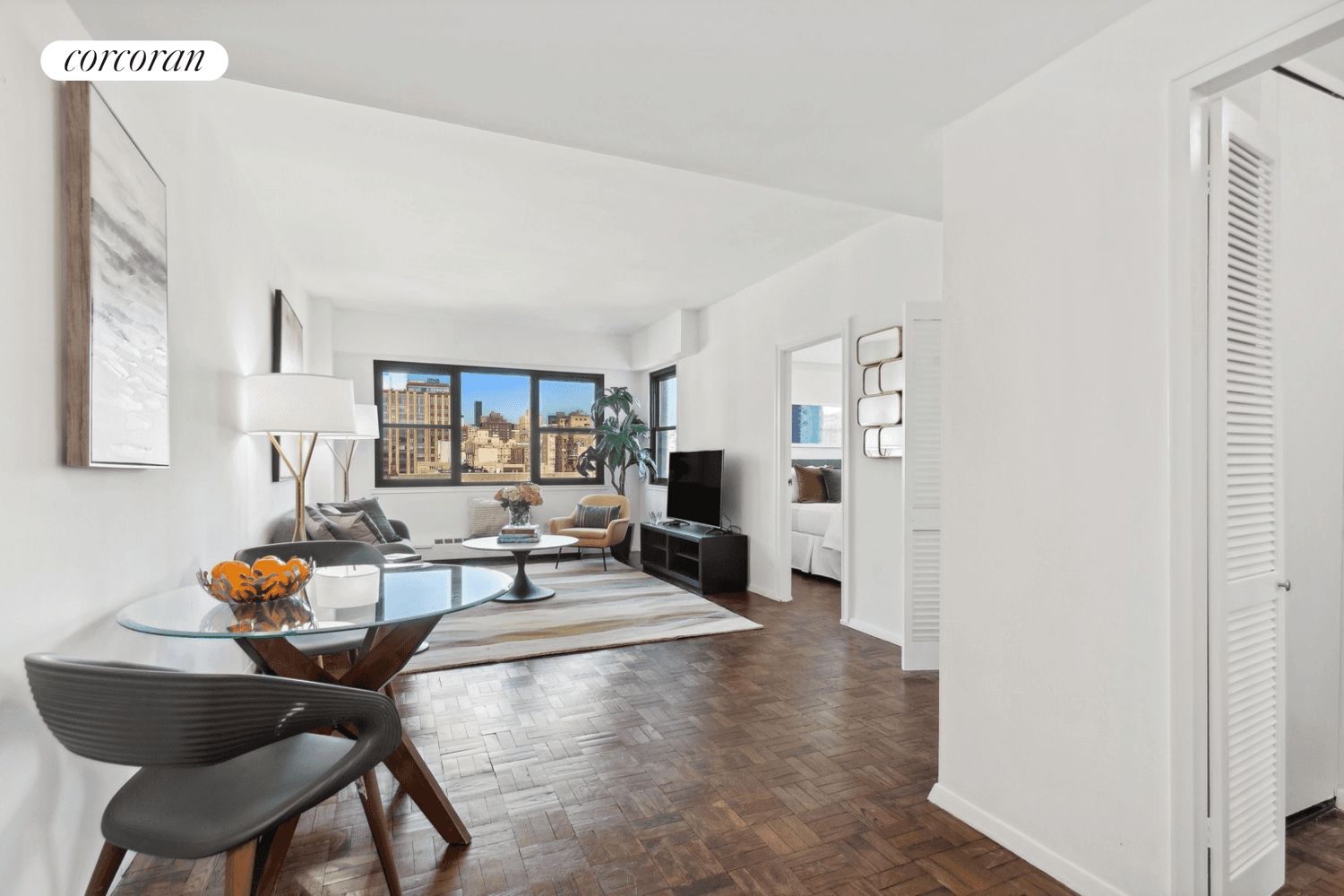Rarely available, large two bedroom on high floor with direct postcard views to the Empire State and Chrysler buildings in a full service building on super charming 15th Street in ...